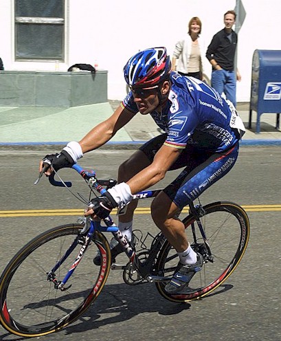 Lance Armstrong delivering some Express Mail with the U.S. Postal Mail box in the background!!